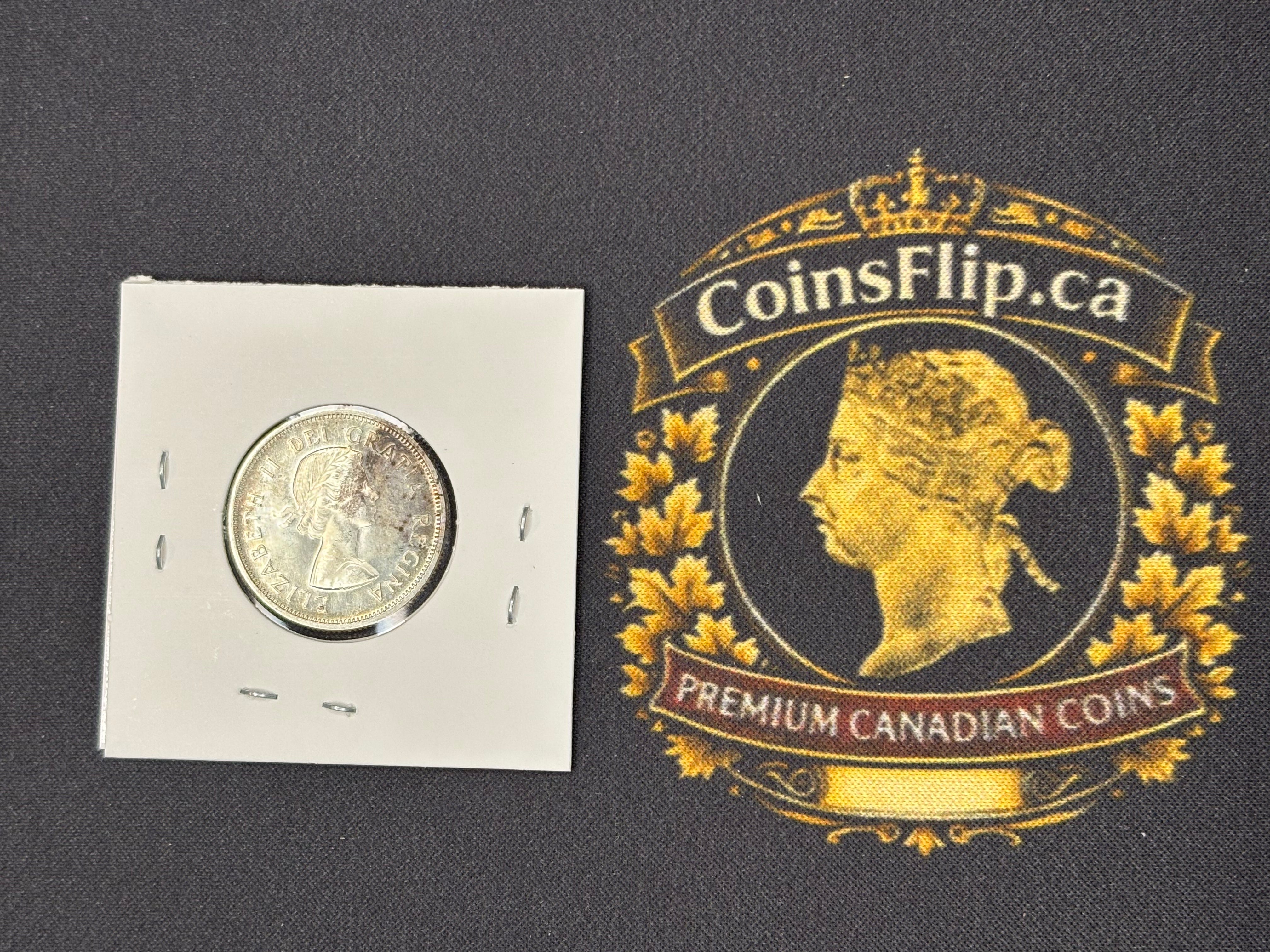Canadian Silver Coin - 25 cents - 1957 MS63
