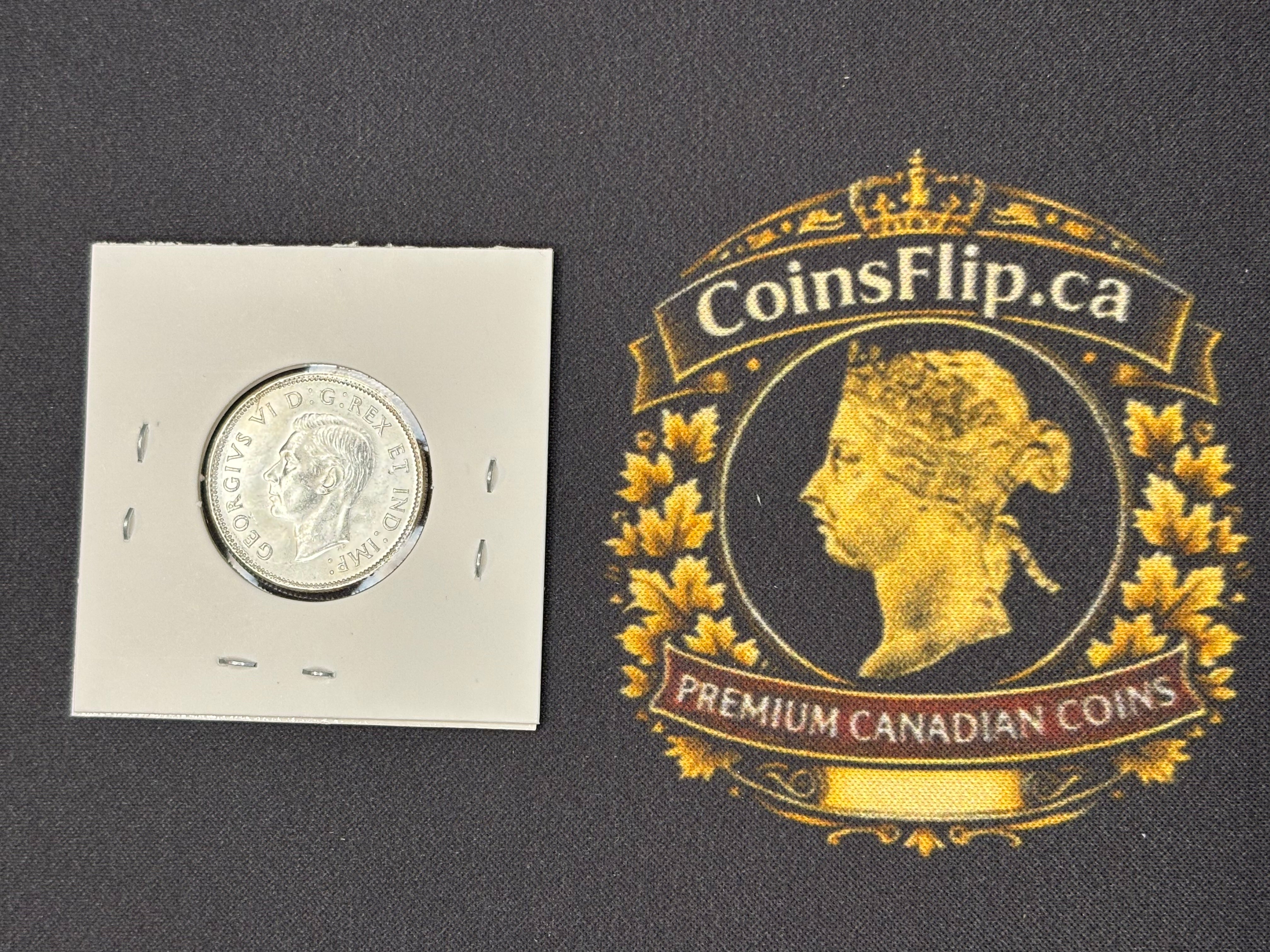 Canadian Silver Coin - 25 cents - 1944 AU55