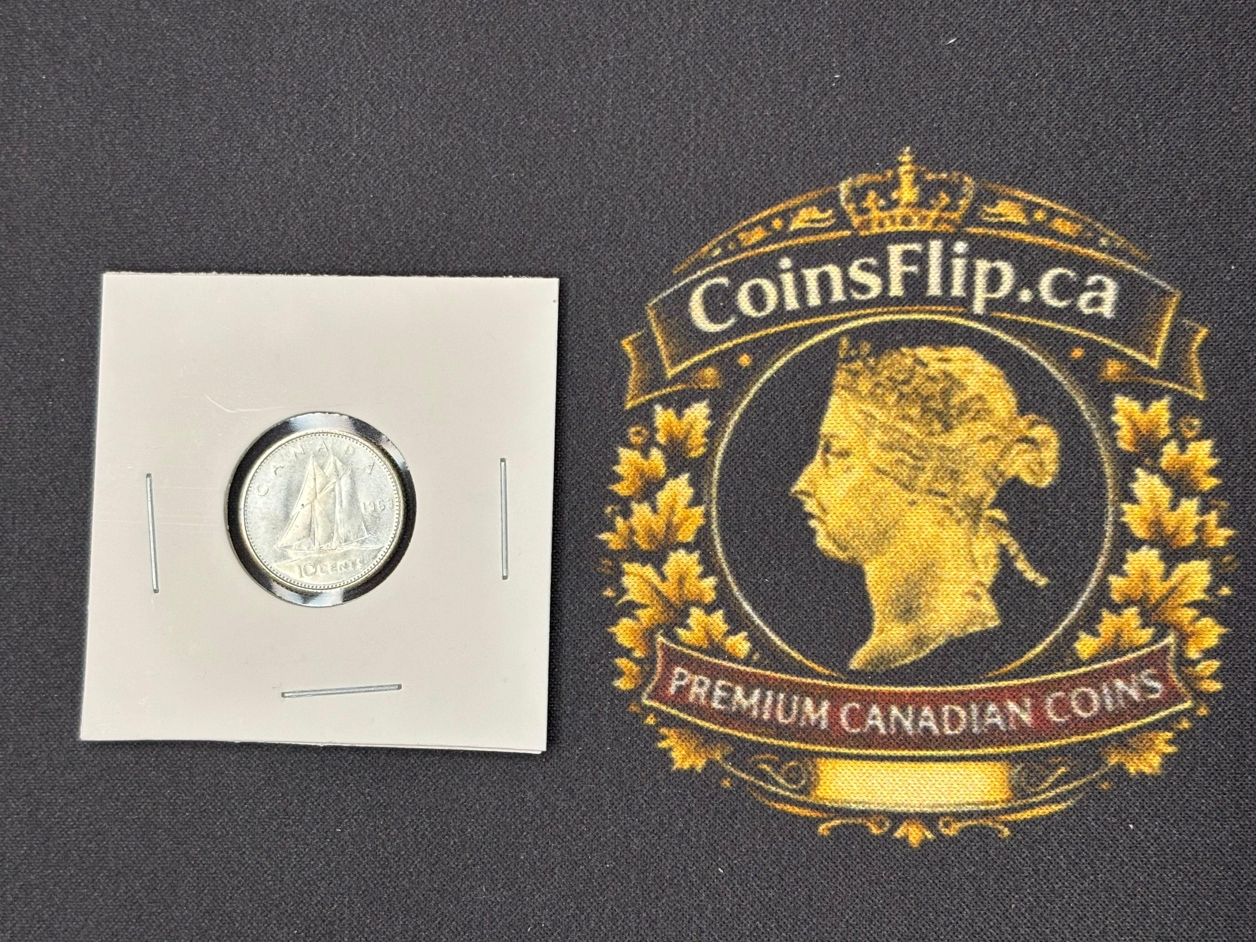 Canadian Silver Coin - 10 cents - 1963 AU50
