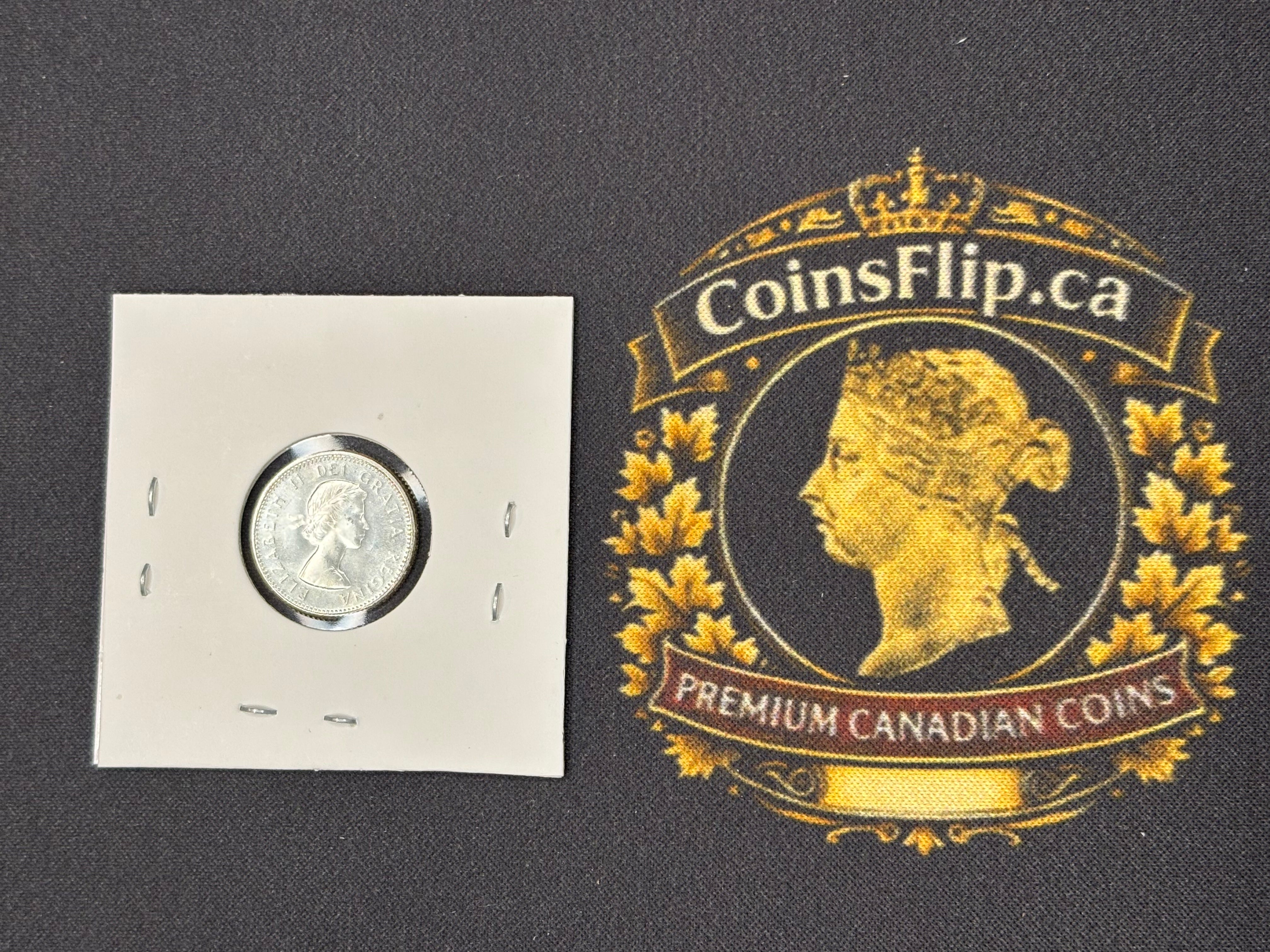 Canadian Silver Coin - 10 cents - 1963 AU50