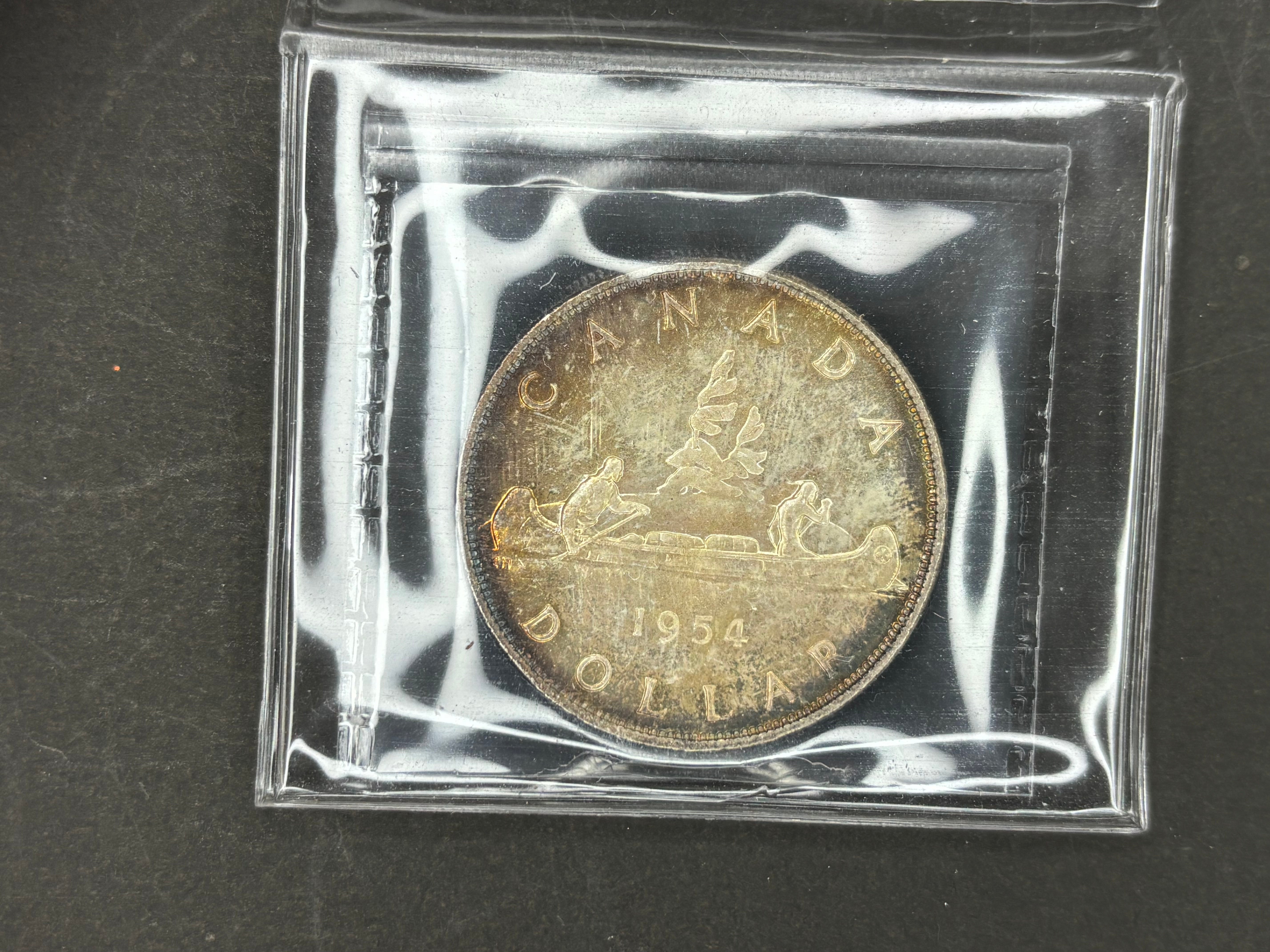 Canadian Silver Coin - Dollars - 1954 Toned - MS65 ICCS