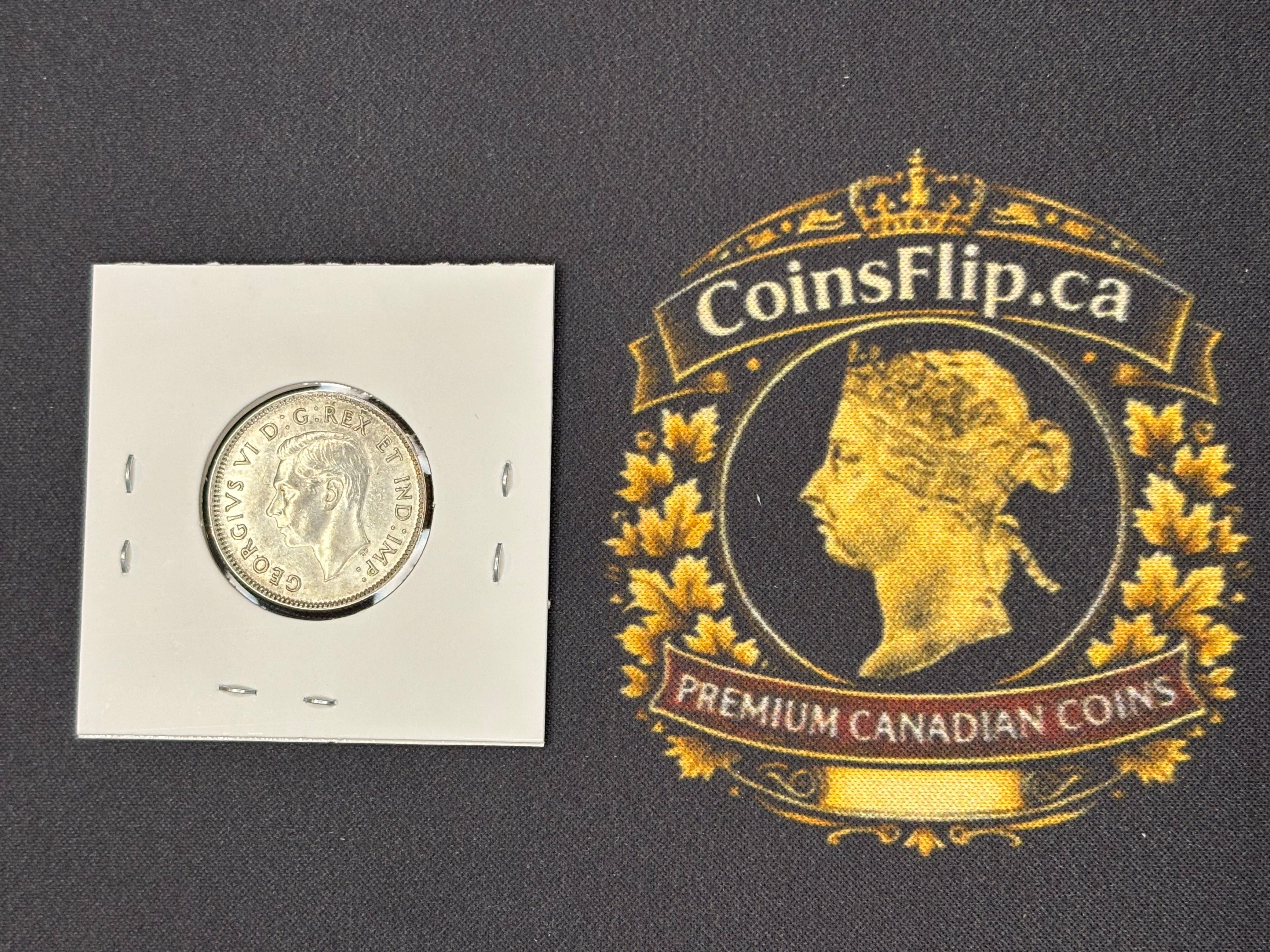 Canadian Silver Coin - 25 cents - 1940 AU