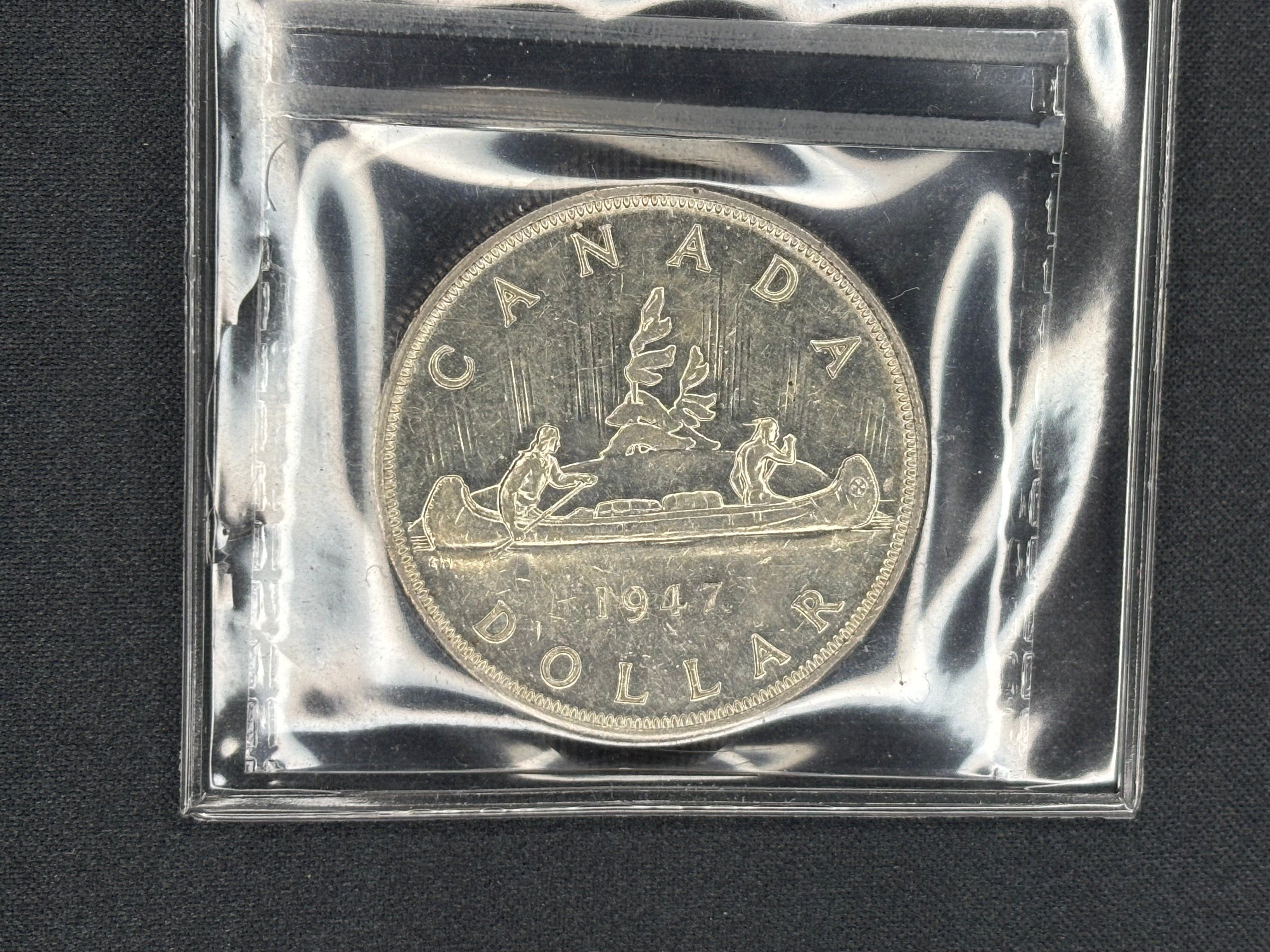 Canadian Silver Coin - Dollar - 1947 Maple Leaf - AU55 ICCS