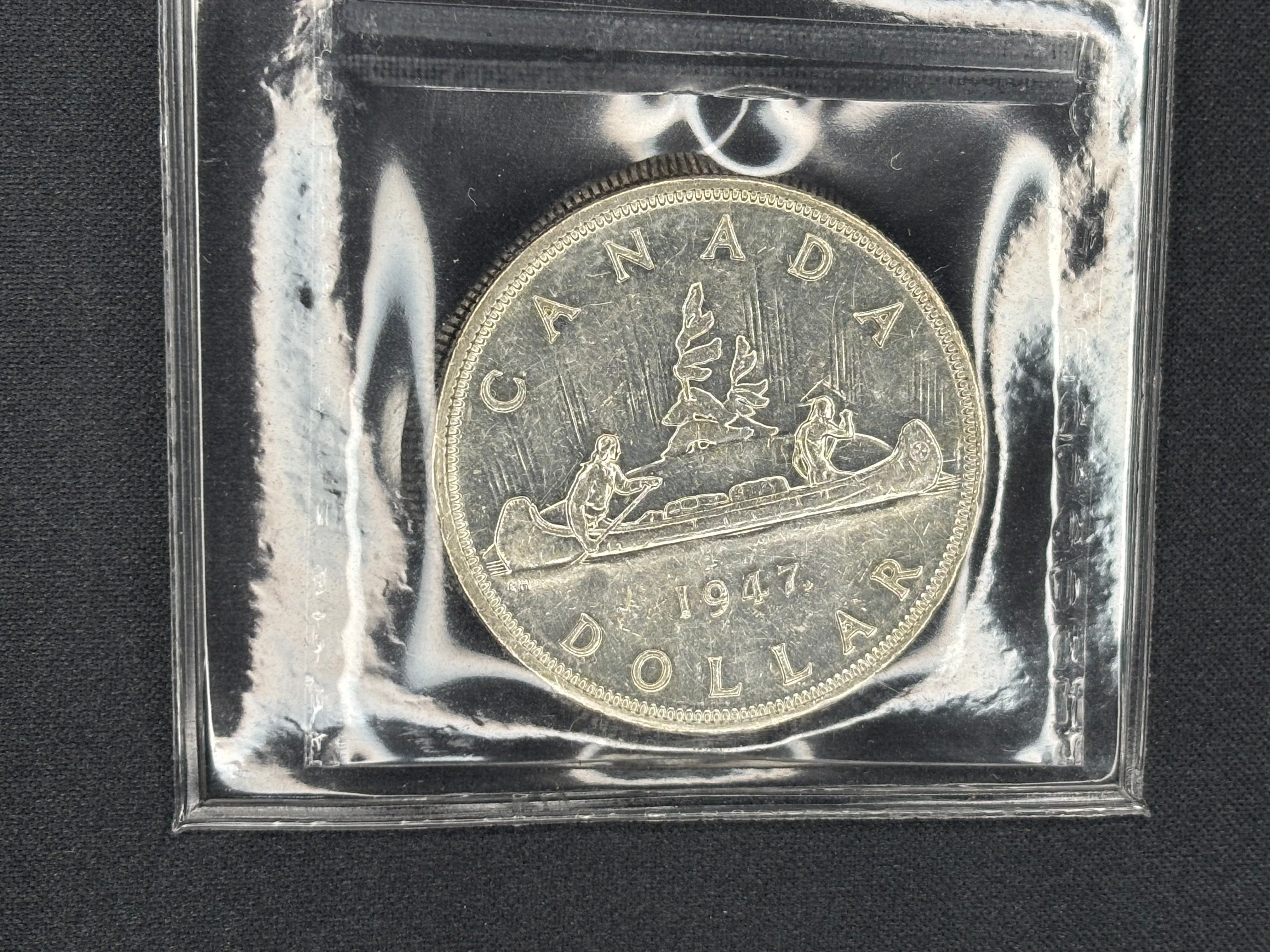 Canadian Silver Coin - Dollar - 1947 Maple Leaf Double HP - EF45 ICCS