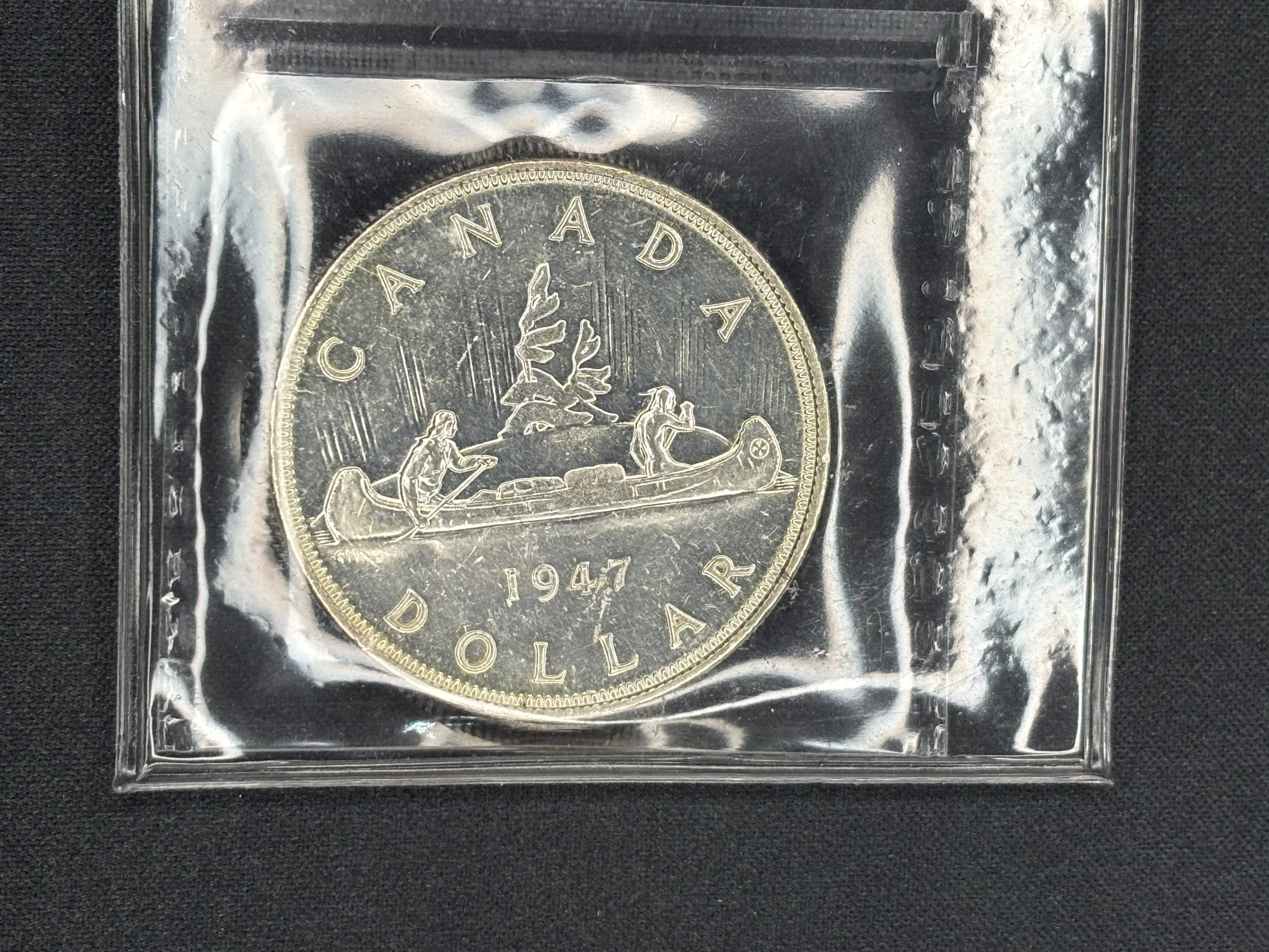 Canadian Silver Coin - Dollar - 1947 Blunt 7 7/7 - MS63 ICCS