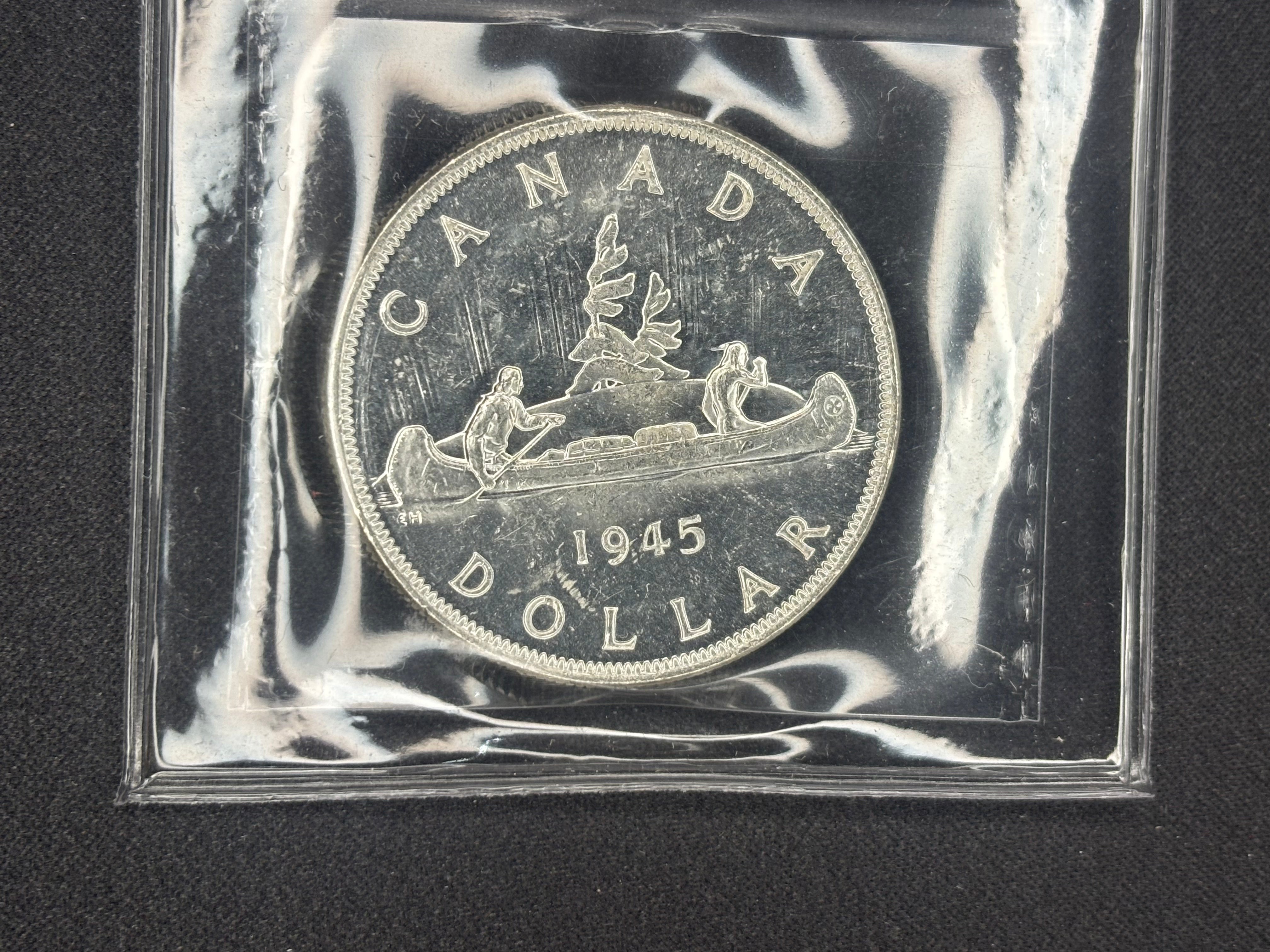 Canadian Silver Coin - Dollar - 1945 5/5 - MS62 ICCS